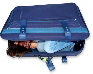 girl in suitcase